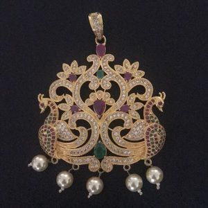 Timeless peacock pendant